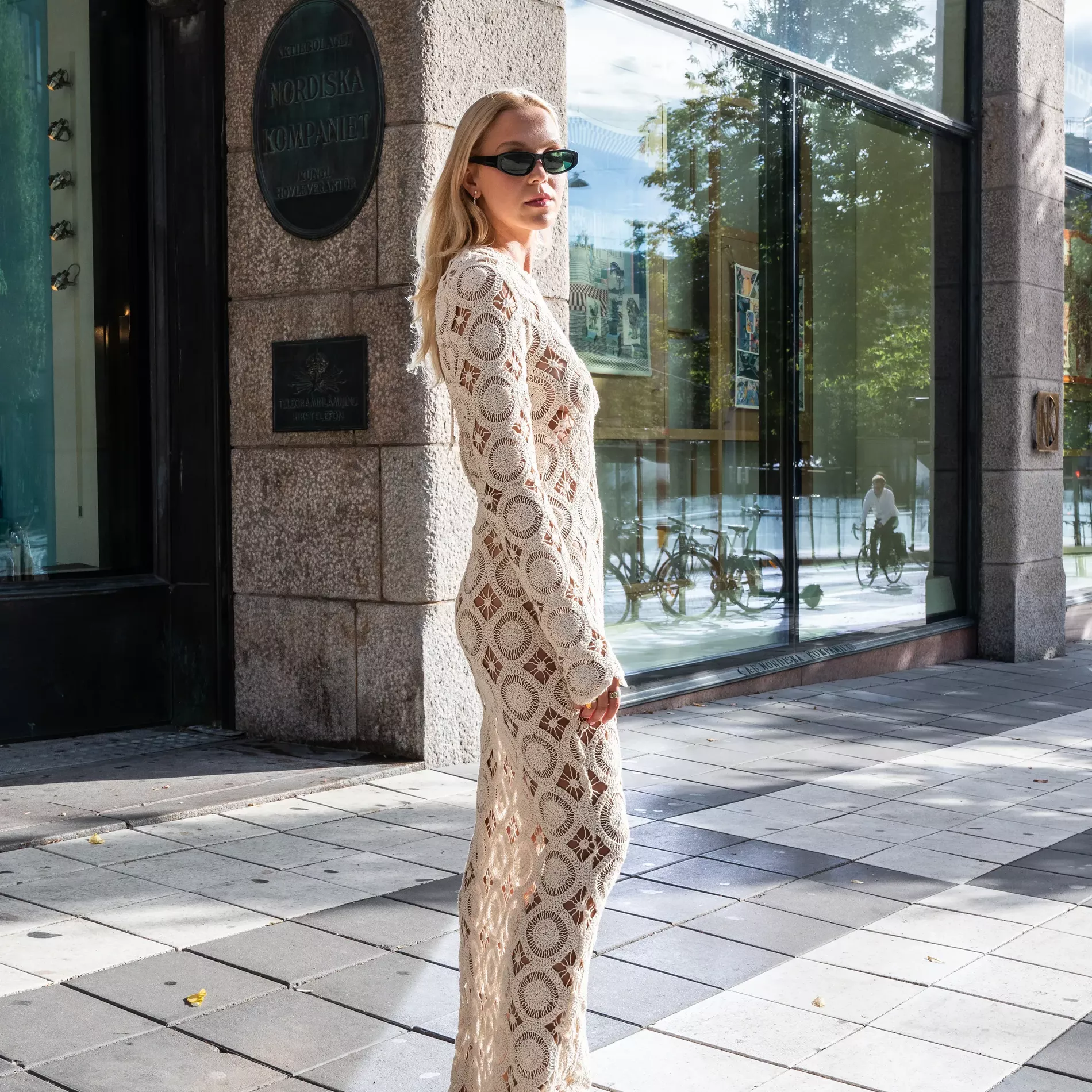 Stockholm fashion week guest wears crochet long sleeve dress 